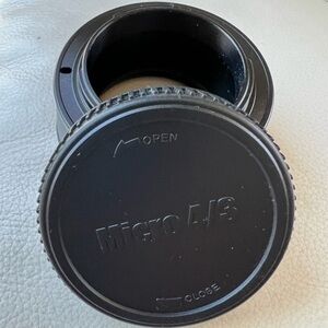 Dollice M42 to micro 4/3 adaptor with lens cap EUC